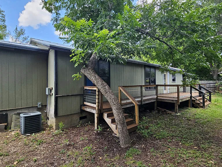 Fenced in Backyard with Deck