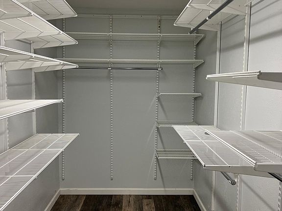 Walk in closet in bedroom