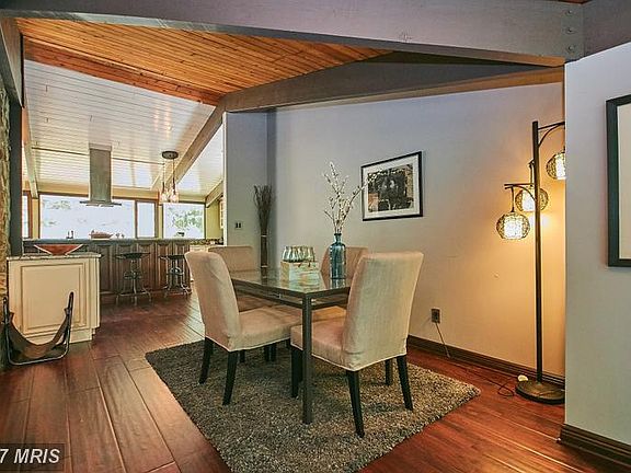 Dining room open to living room and kitchen