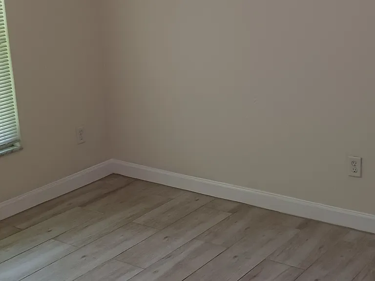 Guestroom-wall color is actually creamy white