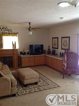 Bonus room with built in cabinets, ceiling fan.  This is great for the family.