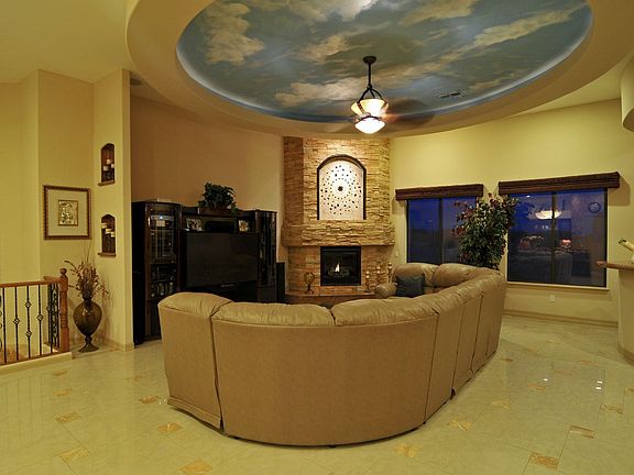 Family room with fireplace and Travertine!