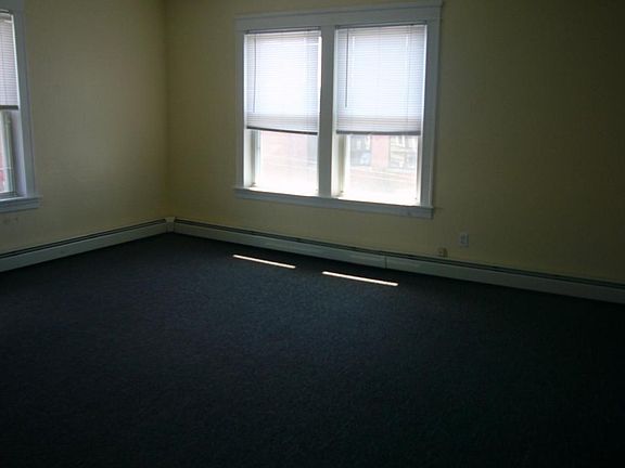 spacious living room with carpet