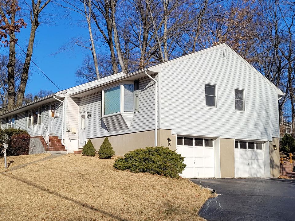 Front of the home with double driveway and large two car garage