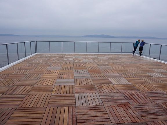 1100 sf Ipe deck with glass railing