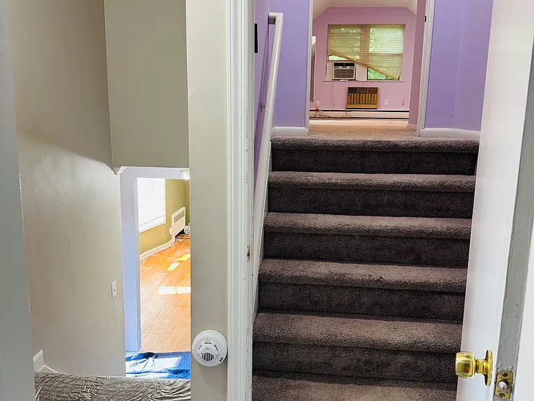 Stairway to finished attic from 2nd floor landing