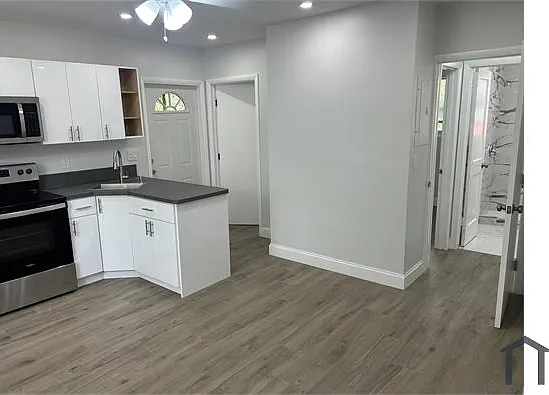 557 NE 63rd St — Photo 7