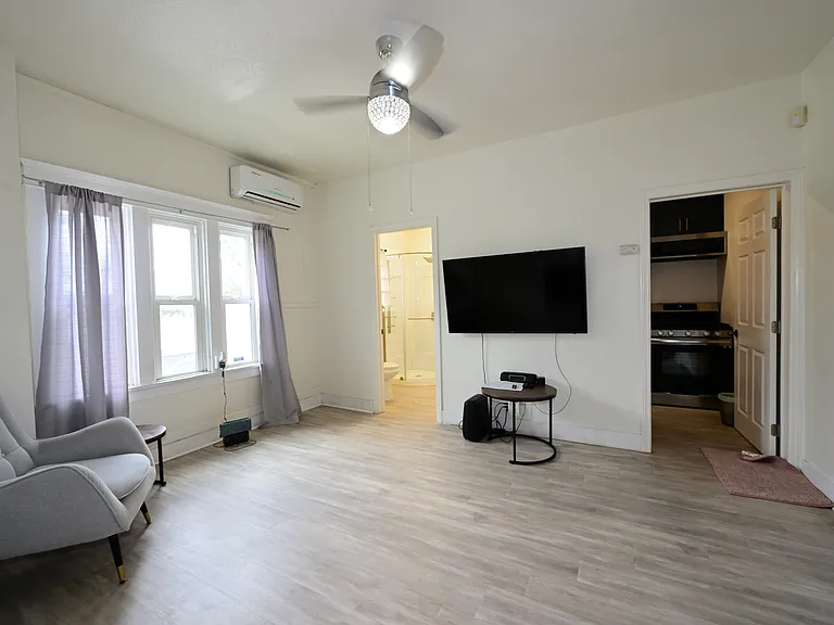 updated unit, super bright with many windows, furnished - any furniture can be removed