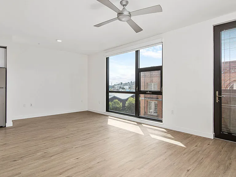 Living Room with Balcony and Hard Surface Flooring