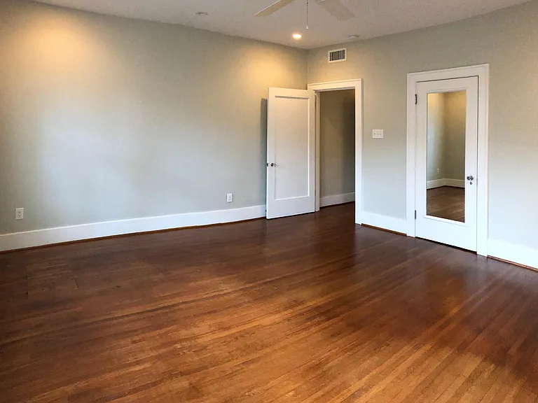 Master Bedroom with mirrored closet door