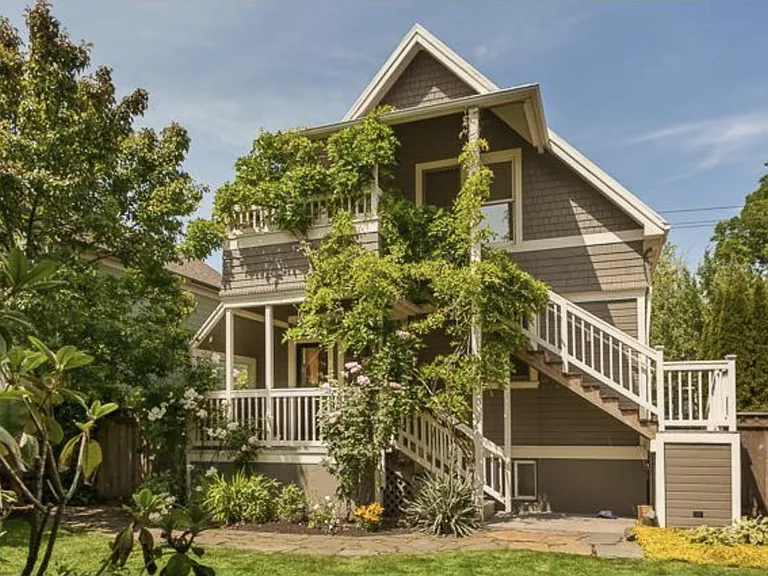 Private covered porch that overlooks backyard.