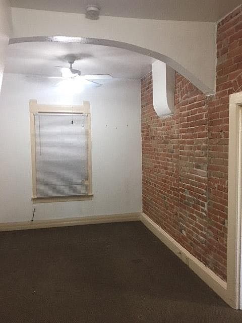 Living room exposed brick