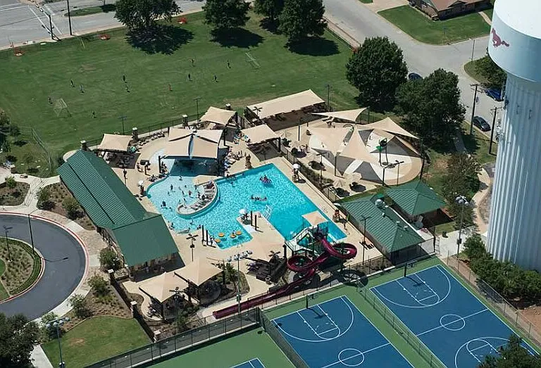 Minutes away, Dove Park features Dove Waterpark with waterslides, diving board, sprayground, zero-depth entry, and $3 admission for Grapevine residents. Plus Casey's Clubhouse playground, pickleball, tennis, trails, picnic areas, and green space.