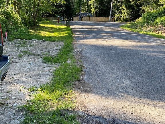 Street view on a quiet dead end road.