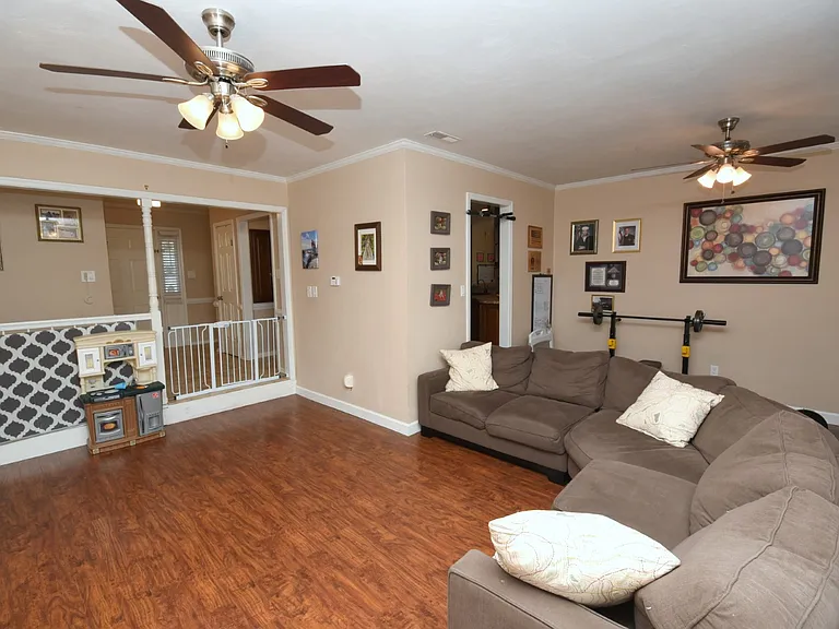 Formal living & dining area, or versatile living area.