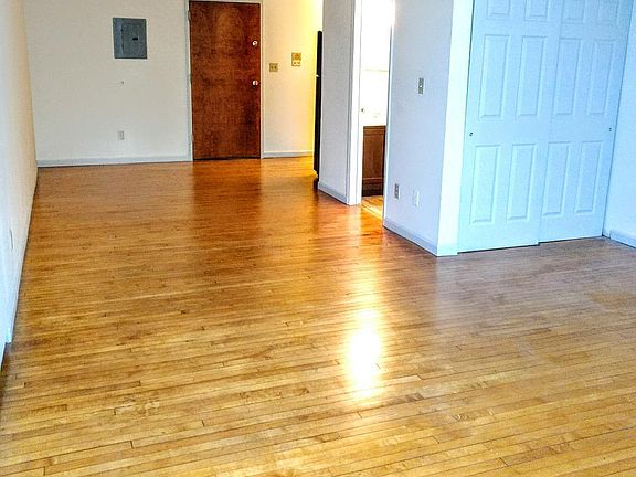 Combine living/dining area with beautiful antique hardwood floors.