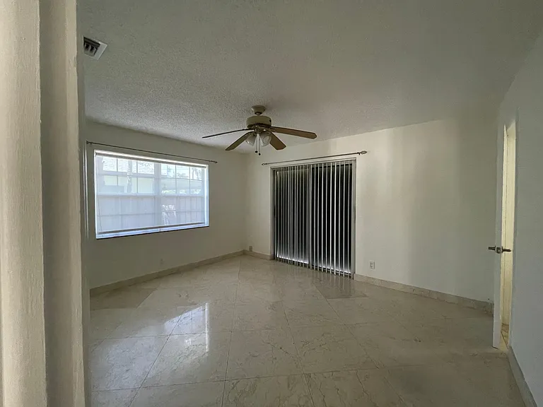 Bedroom #3 (has sliding door leading to backyard)