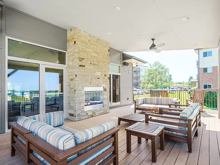 Cozy up by our fireplace on our patio.