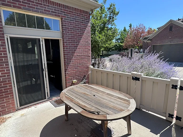 Sunny southwestern facing patio, this is off of the kitchen