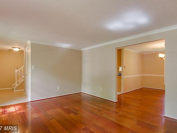 Open to foyer and dining room.