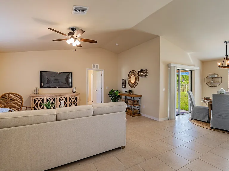 Digitally staged example of Dining & Living Area