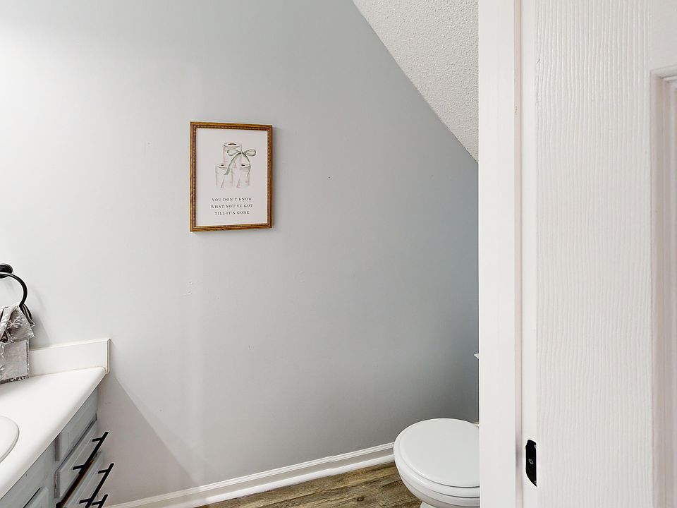 Bedroom two with reach-in closet. Photo is of a similar unit; available unit has the same floorplan. Furniture and decor not included.