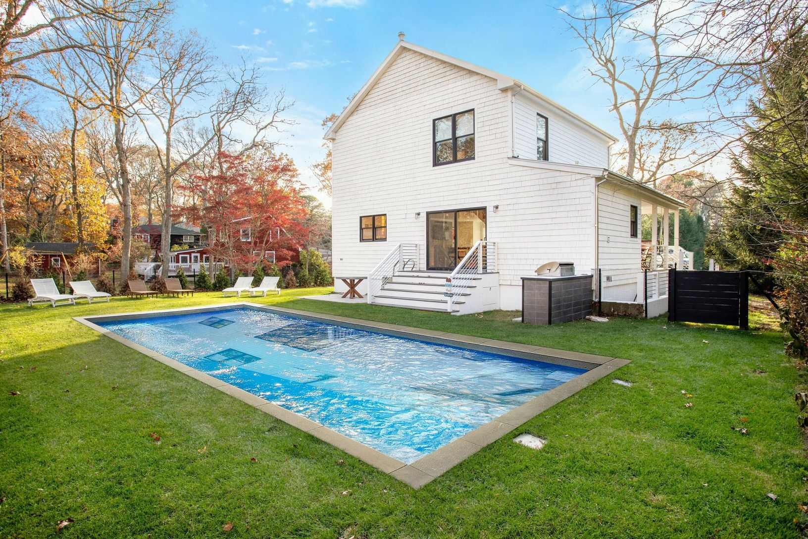  Back of House with pool & Outside Kitchen