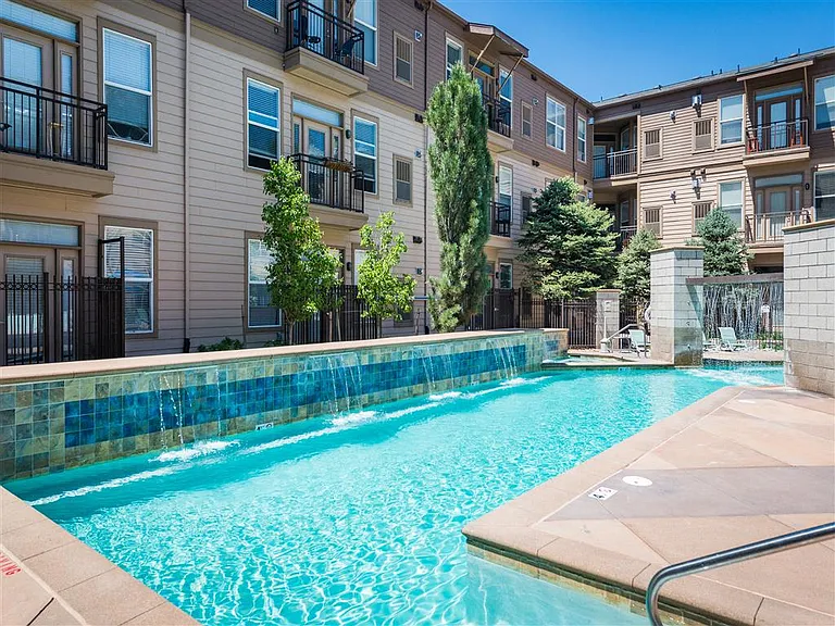 Sparkling resort-style pool with lounge deck