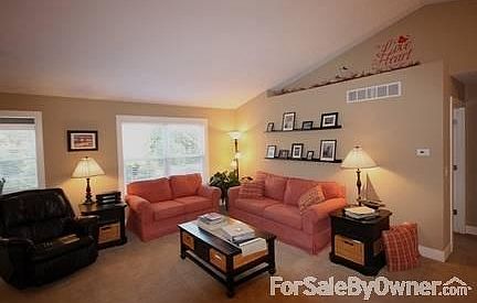 Living room area with cathedral ceiling