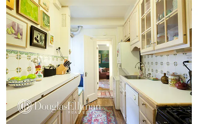 Sold by Douglas Elliman | media 11