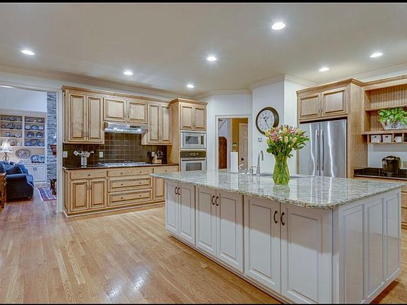 Large chef's kitchen with granite countertops, all stainless steel appliances are included with rental.