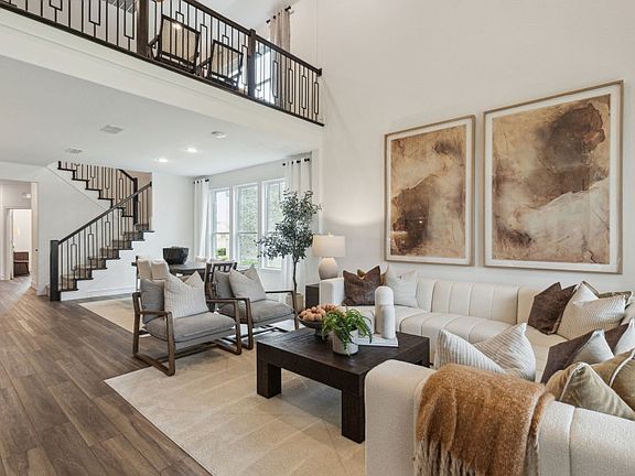 Spacious gathering room with two-story ceilings
