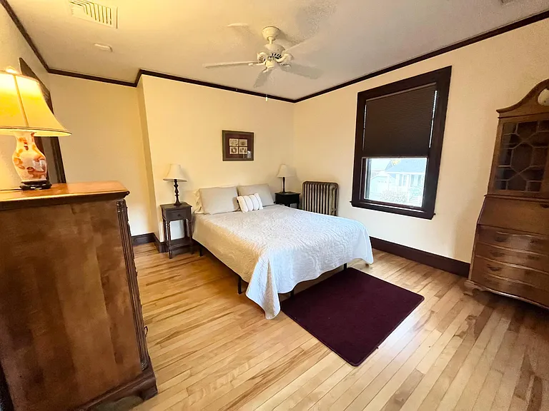 Second bedroom on second floor. Queen size bed.