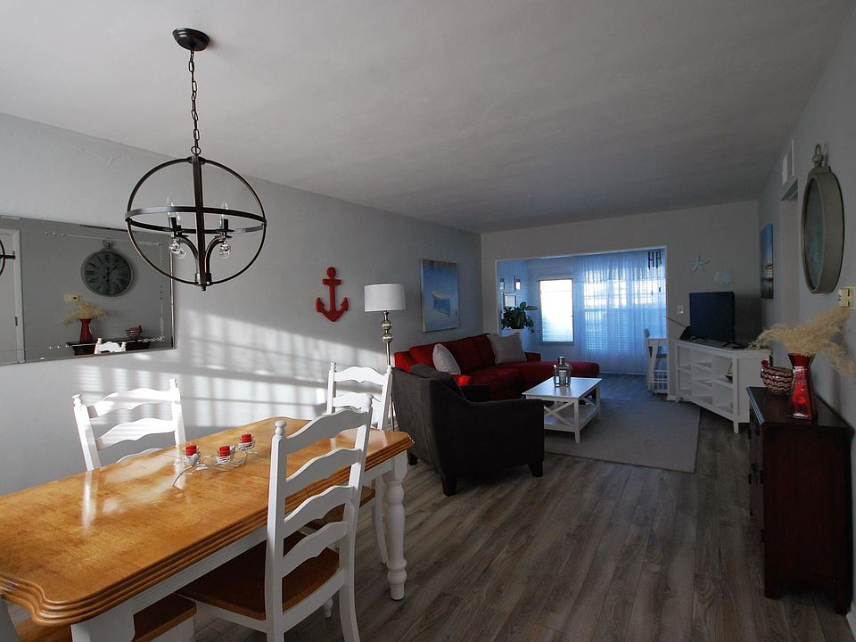Dining and living room with additional office space/den area