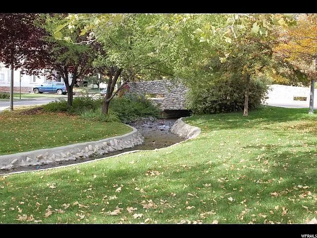 City Creek as your front yard! Memory Grove park two blocks away.