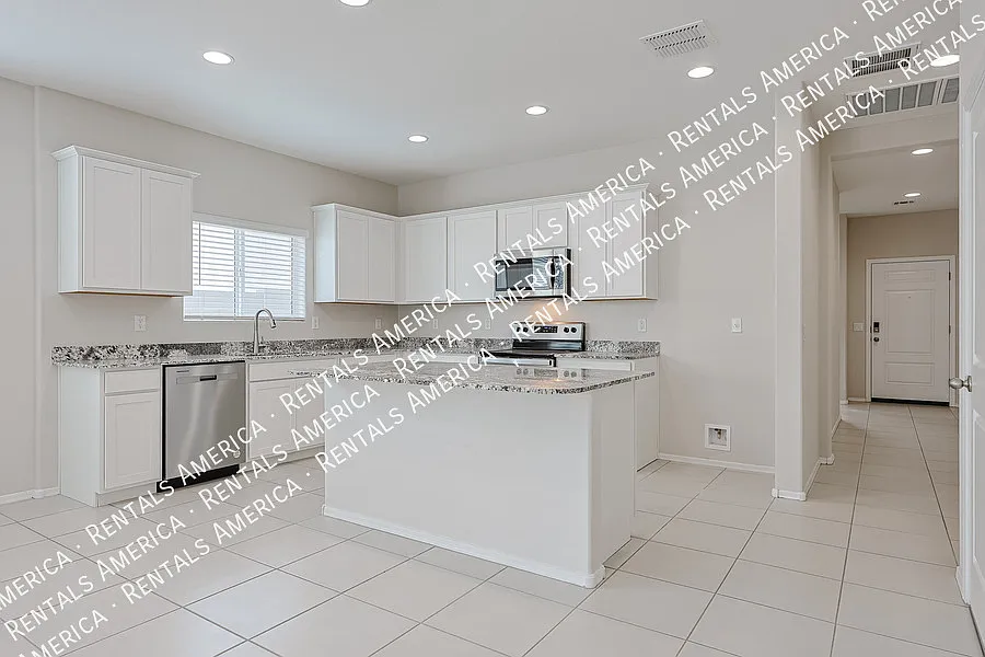10338 W Wier Ave