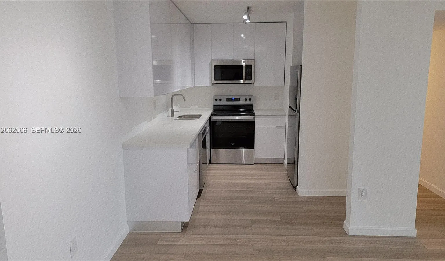 Belinda Gardens Condo — Photo 3