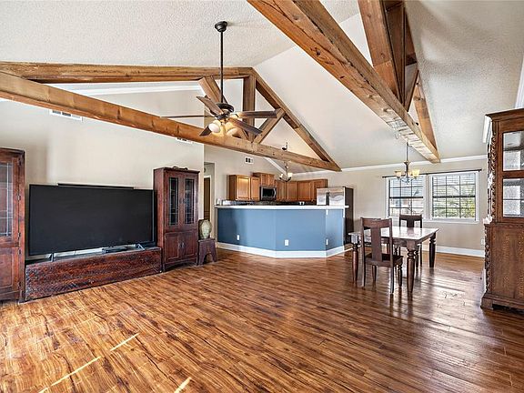View from living space into the kitchen and dining areas.