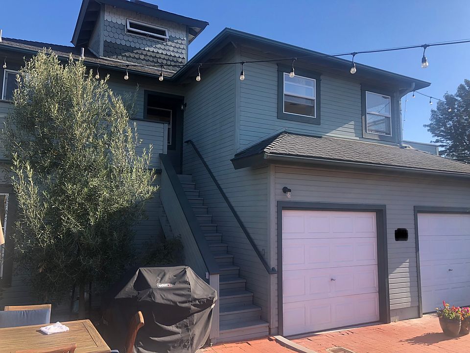 Unit behind main house; garage not included