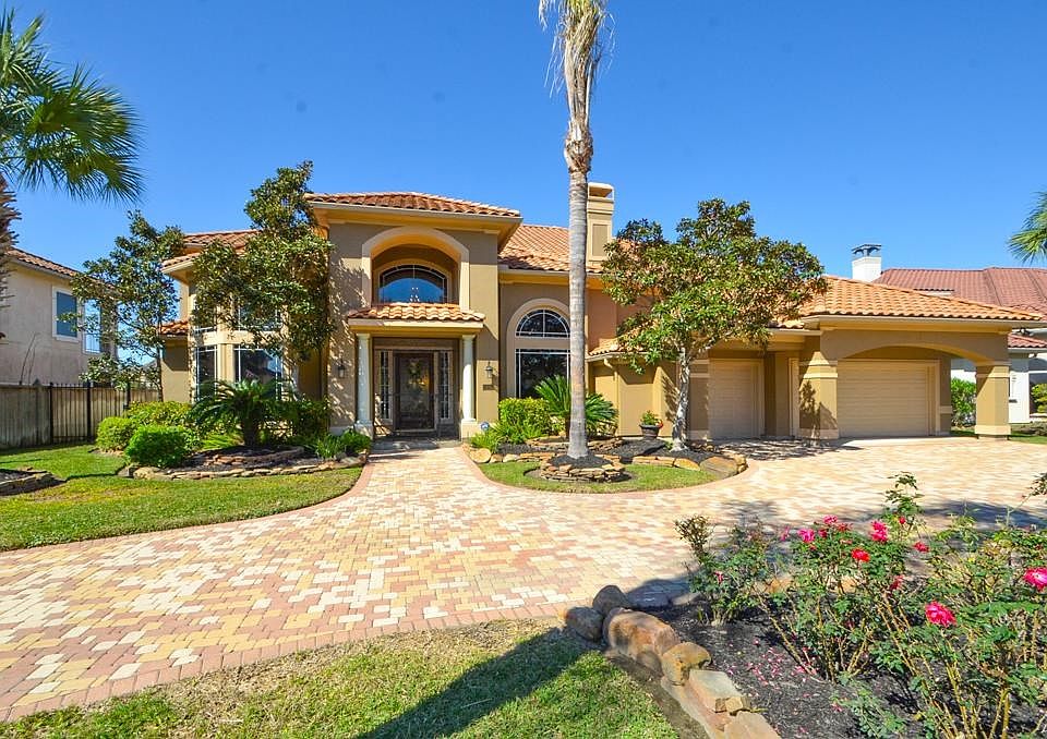 Absolutely breathtaking 5 bedroom home in the gated community of Windsor Park Lakes!