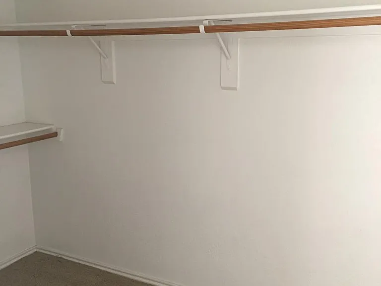 Master Walk in Closet
The floors are laminate now. No carpet