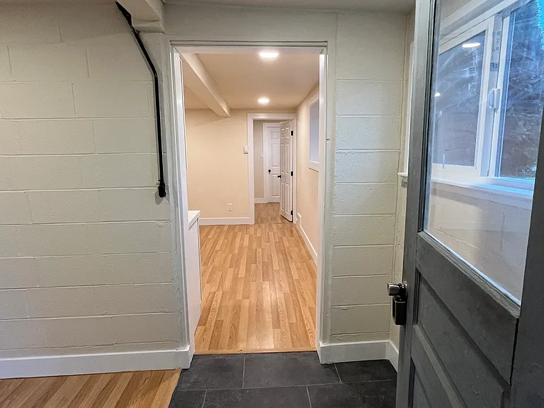 Welcoming enlarged entrance with space for shoes and coats
