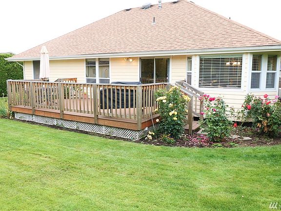 Great deck for entertaining and beautiful rose garden!