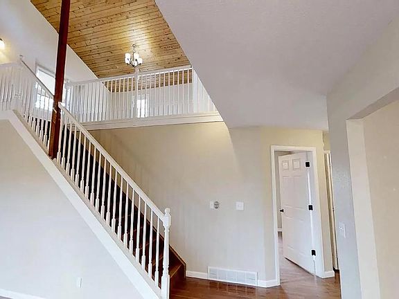 Stairs and Door to Main Level Master