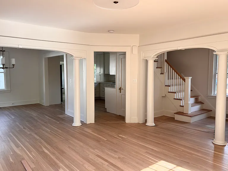 Living Room looking into Foyer and Kitchen.