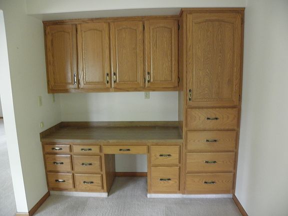 Built in desk with cabinets