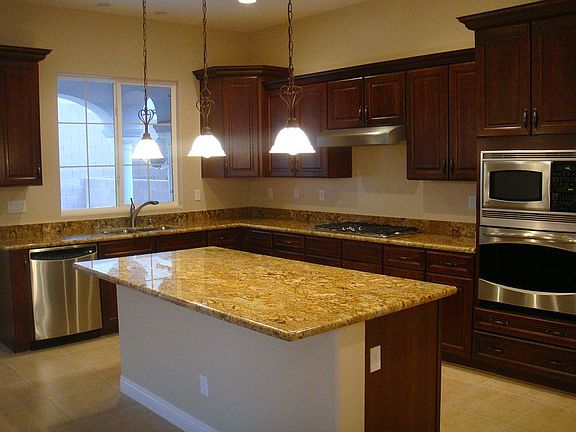 Kitchen Features Upgraded Cabinetry & SS Appliances