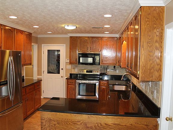 Kitchen facing garage
