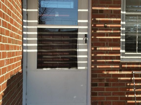 Covered & Private Front Porch with Storm Door + Gorgeous Front Door