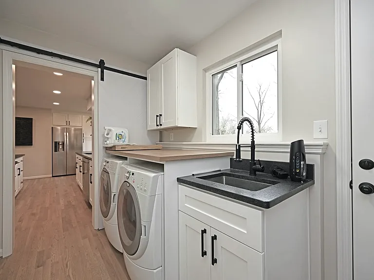 Laundry/mudroom w/access to gartage and private back yard